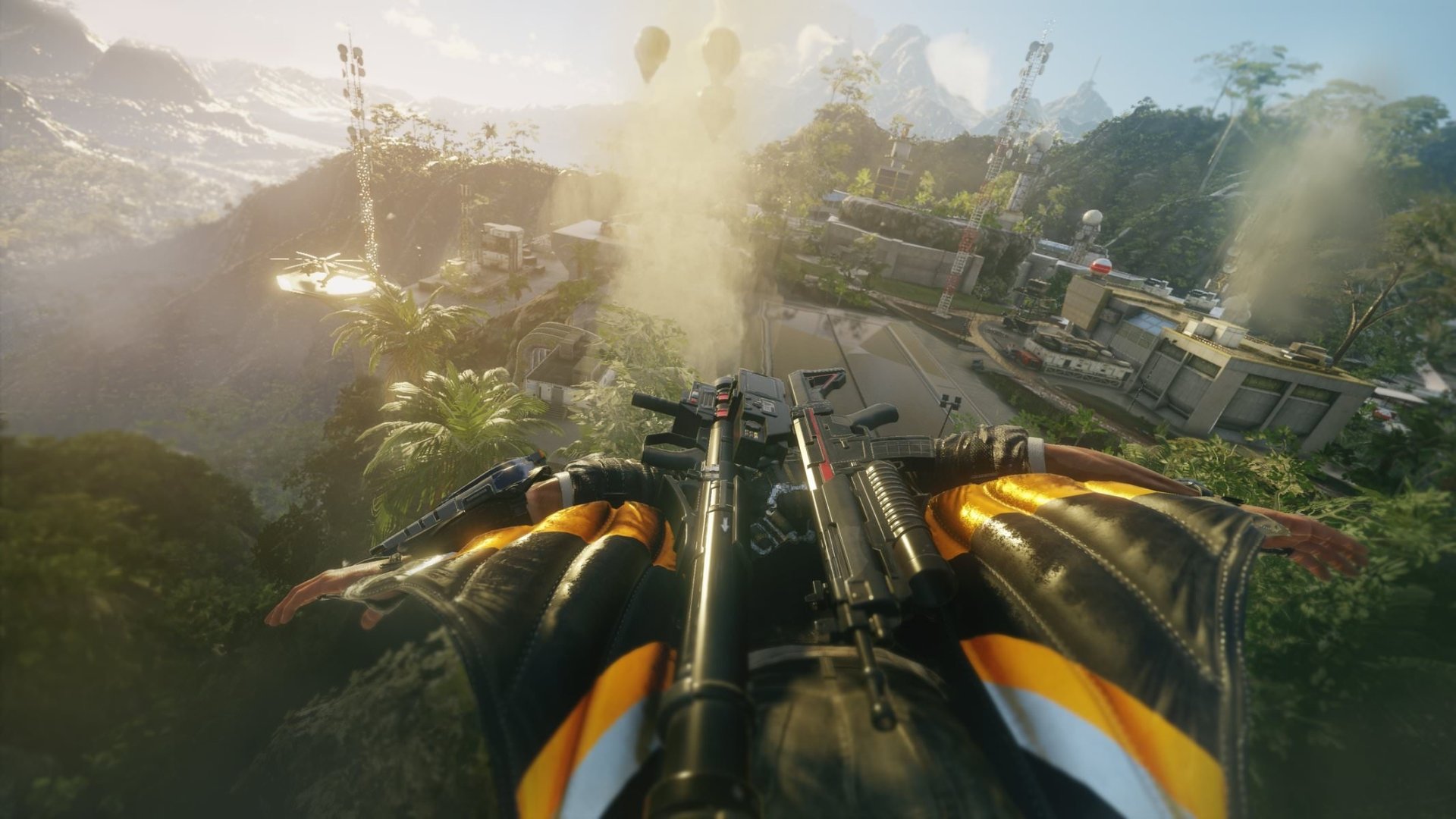 First-person shot from Just Cause 4 video game: player gliding over jungle toward a coastal base. HD PC desktop wallpaper and background.