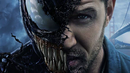 HD image of Tom Hardy from the movie Venom, showing his face partially transformed into Venom, used as a desktop wallpaper and background.