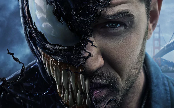 HD image of Tom Hardy from the movie Venom, showing his face partially transformed into Venom, used as a desktop wallpaper and background.