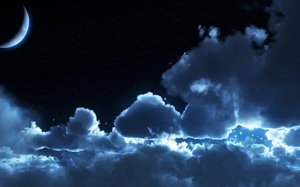A serene night sky featuring a crescent moon surrounded by soft, illuminated clouds. This HD wallpaper captures the tranquil essence of nature.