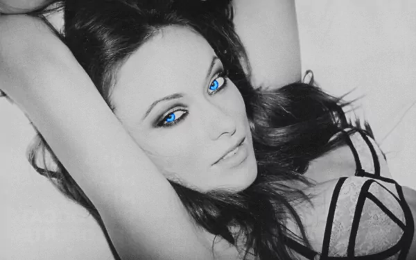 Black-and-white HD desktop wallpaper of celebrity Olivia Wilde with strikingly edited bright blue eyes.