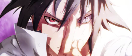 HD desktop wallpaper featuring Sasuke Uchiha from Naruto, showcasing his intense gaze with Sharingan and Rinnegan eyes, and distinctive black hair.