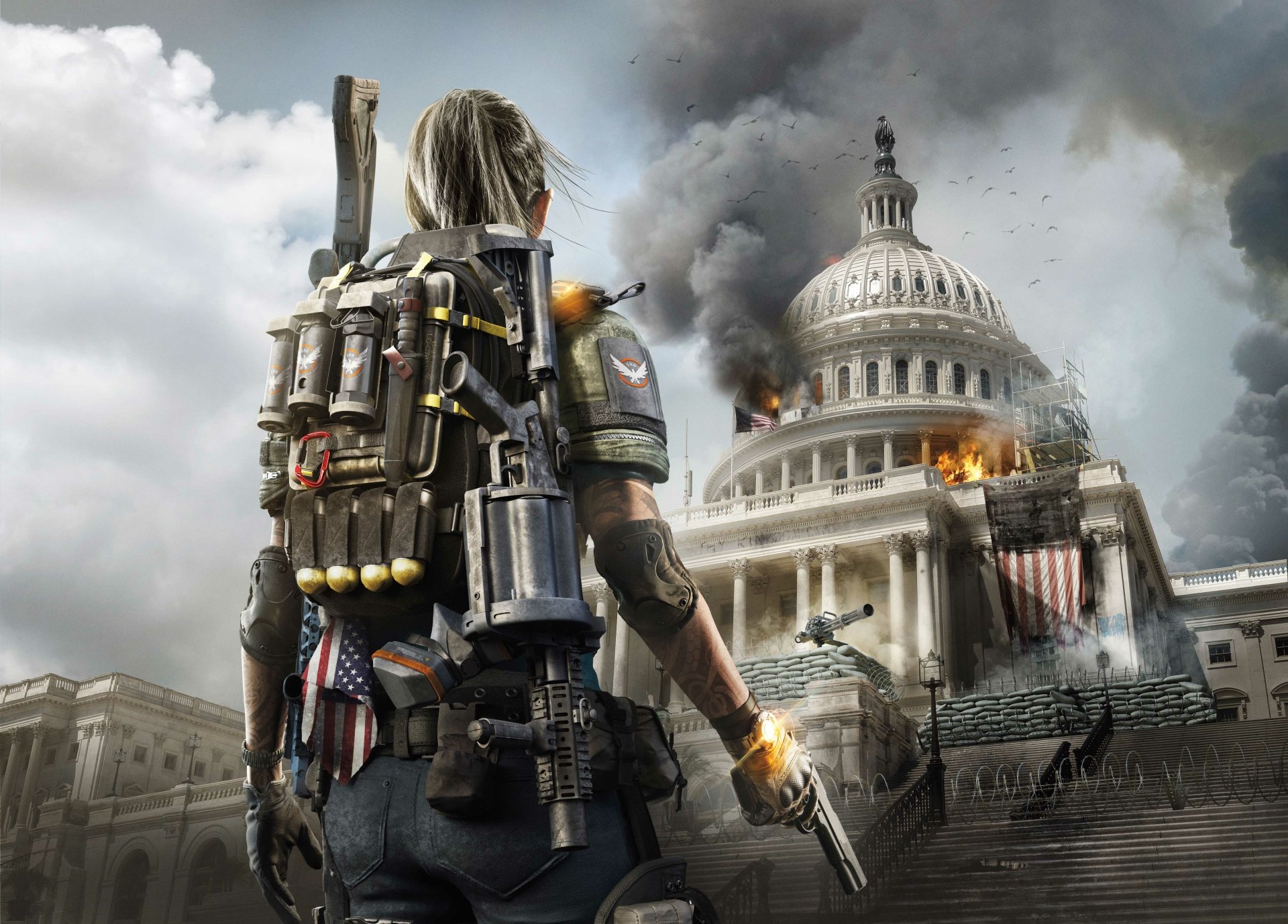 A character from Tom Clancy's The Division 2 stands ready with a weapon, facing a burning Capitol building under a dramatic sky, captured in stunning 4K Ultra HD detail.