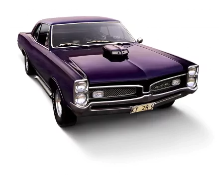 HD PC desktop wallpaper featuring a classic purple Pontiac GTO with a prominent hood scoop, showcasing sleek muscle car design and vintage automotive style.