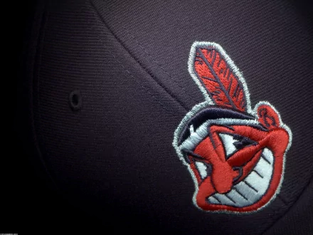 Cleveland Indians logo embroidered on a dark cap, capturing the team's spirited identity. This HD image serves as a striking desktop wallpaper for sports enthusiasts.