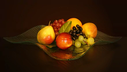 A vibrant still life of pears, grapes, and assorted fruits on a glass dish, captured in stunning 4K Ultra HD as a PC desktop wallpaper and background.