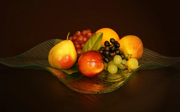 A vibrant still life of pears, grapes, and assorted fruits on a glass dish, captured in stunning 4K Ultra HD as a PC desktop wallpaper and background.