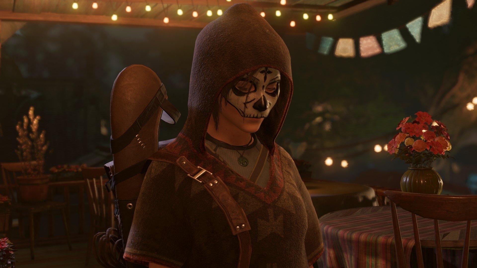 Lara Croft from the video game Shadow of the Tomb Raider, hooded and wearing skull face paint amid festival lights — HD PC desktop wallpaper/background.
