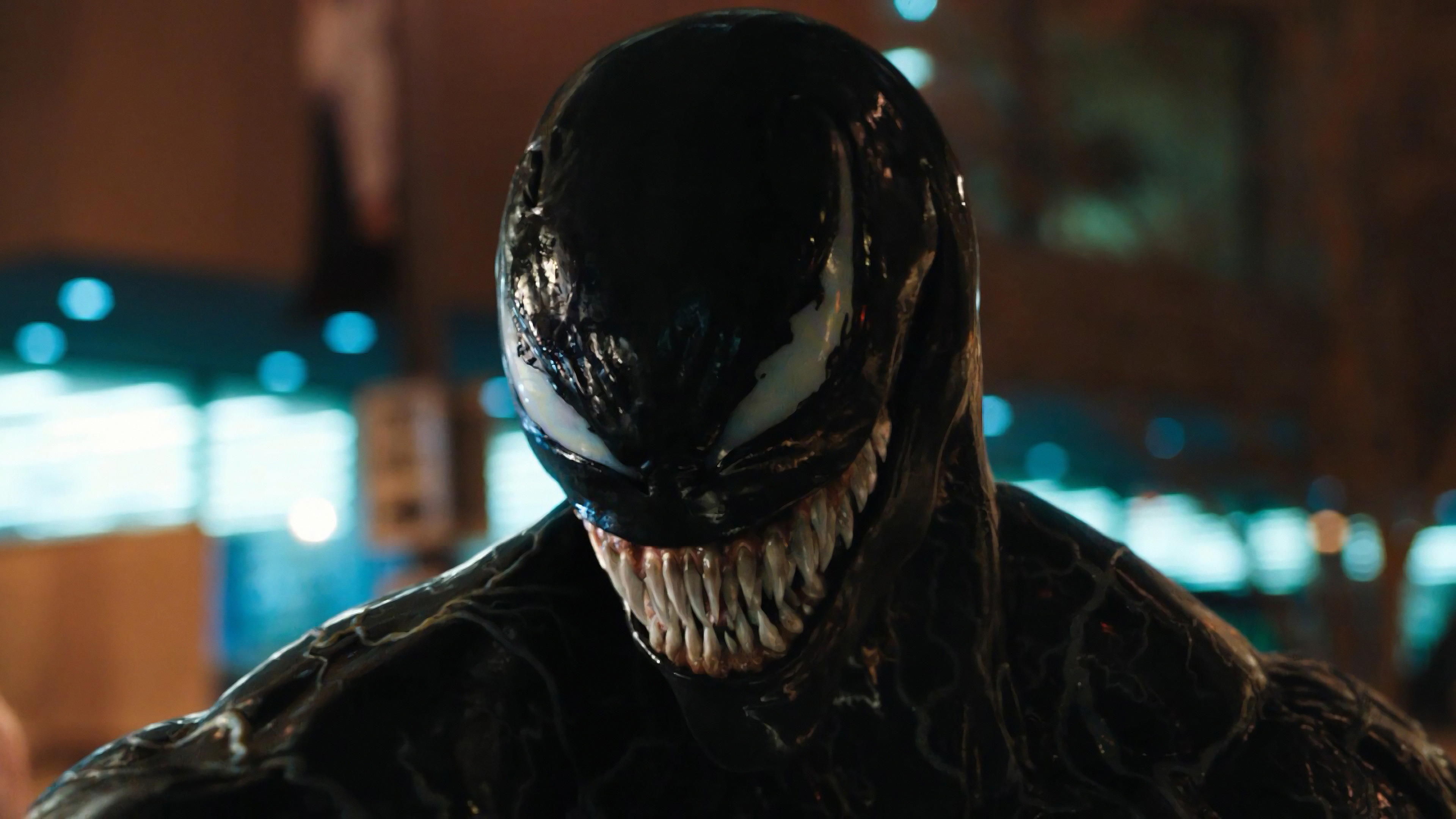 A dramatic Venom movie-inspired HD desktop wallpaper and background.