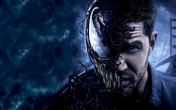 HD desktop wallpaper of Tom Hardy from the movie Venom, showing half his face transformed into the alien symbiote Venom, with a dark, cloudy sky and the Golden Gate Bridge in the background.