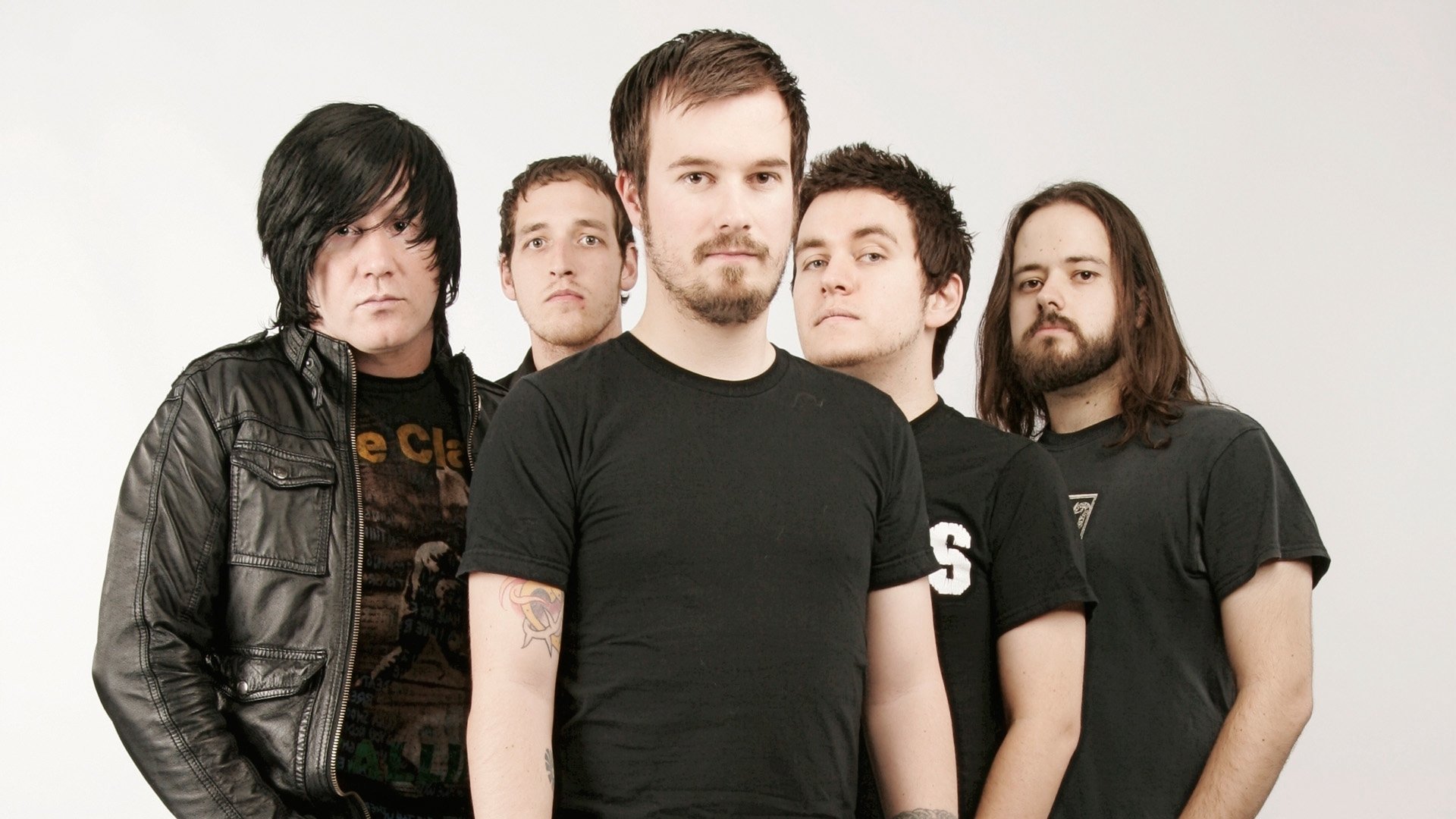 HD desktop wallpaper featuring the members of the band Funeral for a Friend on a plain background.