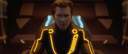 HD PC desktop wallpaper featuring a scene from Disney's TRON: Legacy with a character in a glowing, futuristic suit.