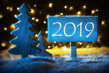 A festive 4K Ultra HD New Year 2019 holiday scene with blue wooden trees and a sign amid sparkling lights and snow, designed as a PC desktop wallpaper background.