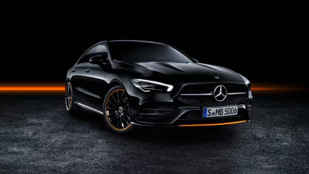 Sleek black Mercedes-Benz CLA-Class vehicle showcased in 4K Ultra HD on a dark textured surface with subtle orange accents.