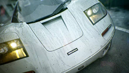 HD PC desktop wallpaper of a white McLaren F1 vehicle front end — wet, high-detail close-up of the nose, headlights and vents as a sharp background image.