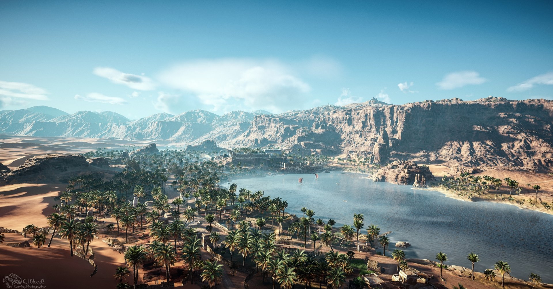 5K Ultra HD PC wallpaper from Assassin's Creed Origins (video game): panoramic Nile scene with palm-lined riverbanks, ancient Egyptian village, sandy deserts and rugged cliffs beneath a clear sky.