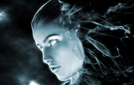 HD PC desktop wallpaper: ghostly fantasy woman's face — a pale, spectral girl with glowing eyes dissolving into smoky, translucent wisps against a dark, ethereal background.