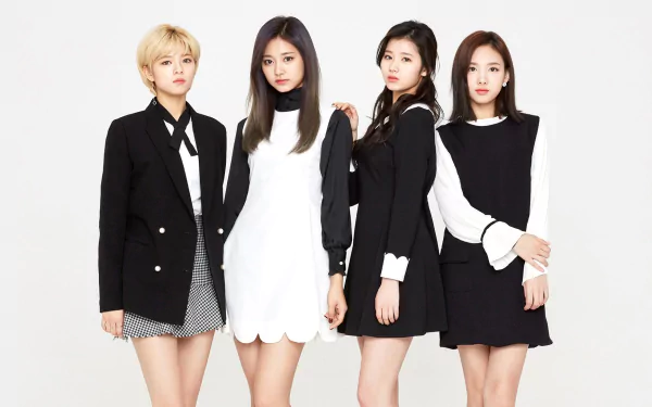 HD PC desktop wallpaper: four K-pop singers in coordinated black-and-white outfits posing against a white backdrop, stylish promotional music group portrait.