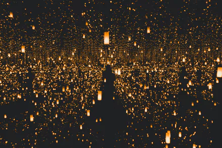 A 4K Ultra HD desktop wallpaper featuring countless man-made lanterns glowing brightly against a dark background, creating a mesmerizing and immersive scene.