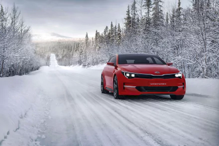 A red Kia Sportspace concept car drives through a snowy forest road, captured in 4K Ultra HD for a PC desktop wallpaper background.