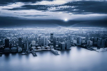 A stunning HD desktop wallpaper showcasing the man-made skyline of Jersey City under a dramatic sky at dusk.