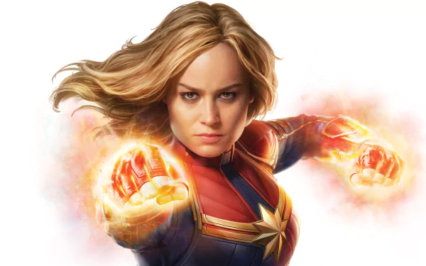 HD desktop wallpaper featuring Brie Larson as Captain Marvel, with blonde hair and glowing fists, in a dynamic action pose from the movie Captain Marvel.