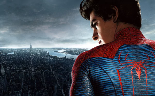 Andrew Garfield as Spider-Man overlooking a cityscape in a 4K Ultra HD desktop wallpaper from The Amazing Spider-Man movie.